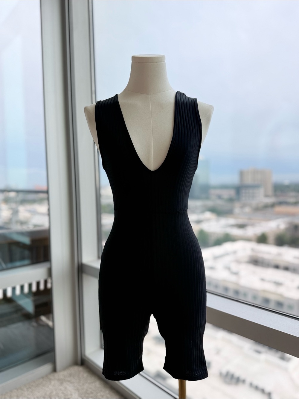 PrettyLittleThing Black Ribbed Deep V Open Back Biker Short Romper